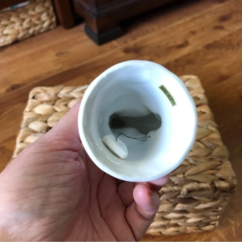 White ceramic Blowing Rock unicorn bell